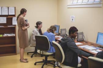 Women participate in a course at Project Self-Sufficiency.