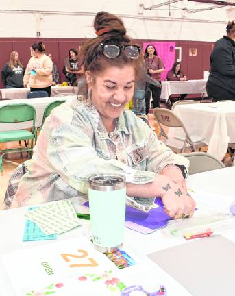 Debbie Yodice of Franklin participates in the bingo and tricky tray.