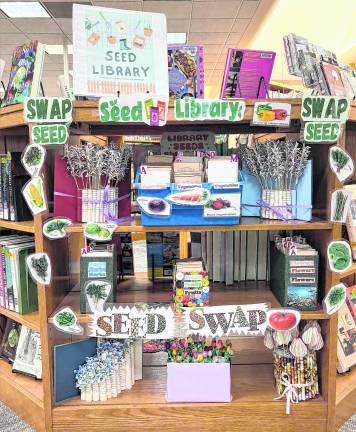The new seed library is shown at the Louise Childs Library.