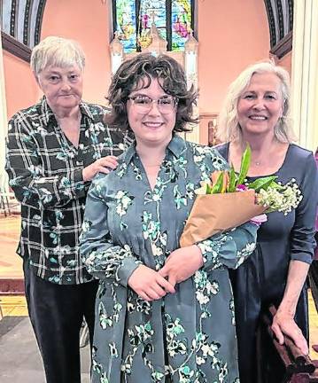 Addison Hardin, center, received a music scholarship from the Sussex County Oratorio Society.