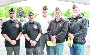 Veterans Jamie Shrope, Joseph Moaco, Commander Franklin Smith, Tom Armstrong and Greg Vough, all of VFW Post 5360 pose for a photo.