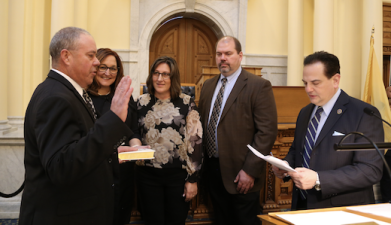 Parker Space, left, of Wantage takes the oath of office as a state senator representing Legislative District 24 on Tuesday, Jan. 9 in Trenton. (Photos provided)