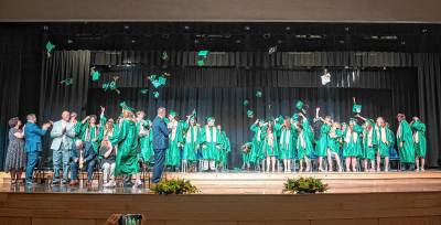Sussex County Technical School graduates toss their caps at the end of graduation Wednesday, June 18. (Photos by Nancy Madacsi)