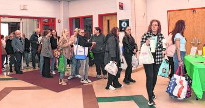 Guests line up to enter the tricky tray.