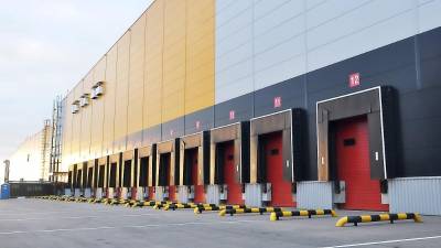 The loading bay of a large warehouse (Bigstock photo)