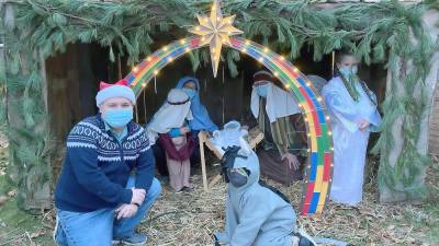 Nativity players gather at the manger (Photo courtesy of Father Julio)
