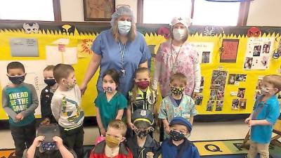 Children and staff members dressed as essential workers (Photo provided)