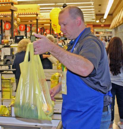 Matt Jones from Lakeland EMS bags with care.
