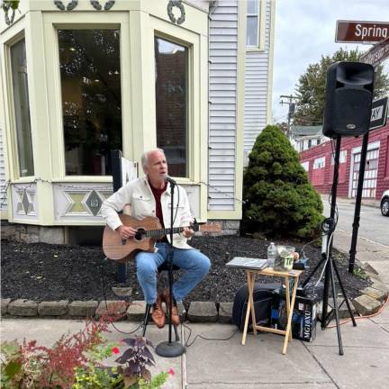 James Gedeon performs on the corner of Spring and Jefferson streets.