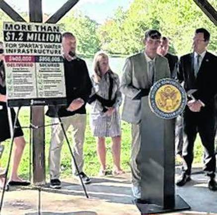 <b>The Sussex County commissioners are shown at an event highlighting improvements in Sparta’s water infrastructure.</b>