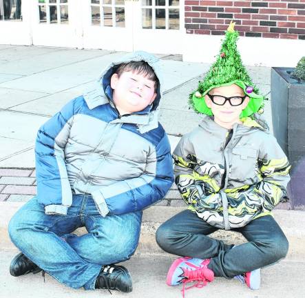Carson Lacken of Freedon and Patrick Moog of Blairstown watch the parade.