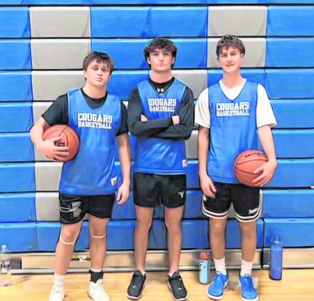 From left, Justin Blair, Michael Strong, Mason Reed