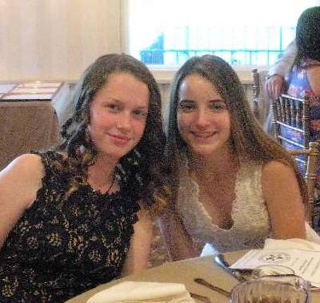 Long Pond School 8th-graders Corinne Crowley and Bridget Kerrick enjoyed dinner together before receiving their Presidential Awards for Excellence.