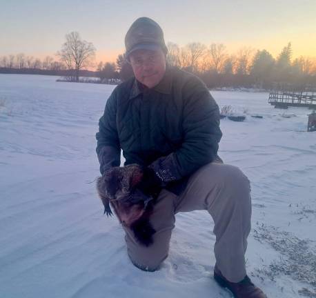 <b>Parker Space is shown with the Sussex County groundhog, Stonewall Jackson.</b>
