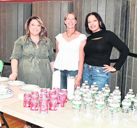 Victoria Davis, MaryJane Elzinga of Lafayette and Iris Cabrera of Branchville pose for a photo.