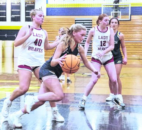 Vernon's Madigan Van Blarcom handles the ball.