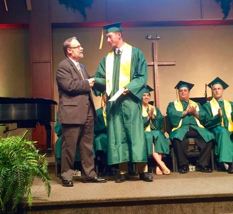 Dr.Paul Vincenti presents Chris Carbone Memorial Scholarship to Sam Allison.