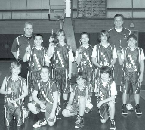 Photo Provided Front, from left to right: Zach Finkelstein, Zach Dole, Jake Tarabokija and Logan Sweeney. Back, from left to right: Coach Mike Heller, John Nitting, Jonny VanNess, Jake Heller, Billy Carson, Assistant Coach John Nitting and Thomas Salomon.