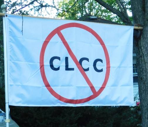 A banner marks the residence of someone who rejects the Cranberry Lake Community Club's (CLCC) notion that lakeside residents must join the CLCC, even though the lake is owned by the State of New Jersey, not the club. (Photo by Mandy Coriston)