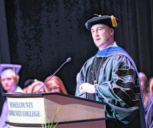 <b>Dr. Cory Homer, SCCC president, addresses the audience at his inauguration ceremony.</b>