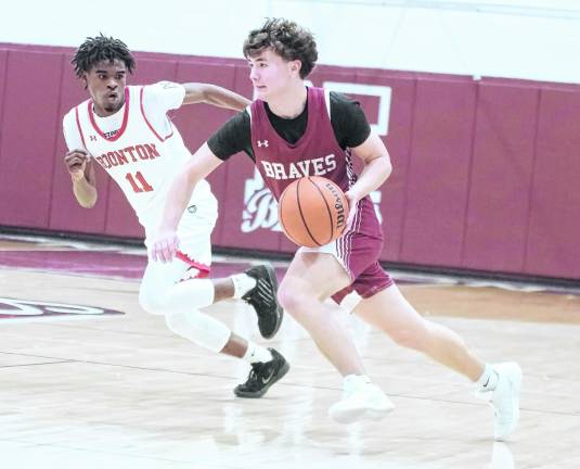 Newton's Hunter Wolfe is on the move with the ball.