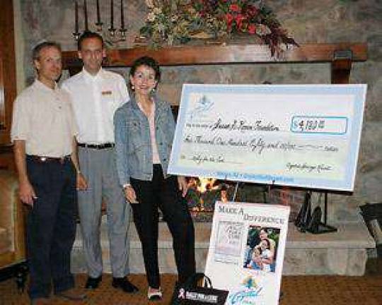 Golf outing nets $10K for breast cancer research