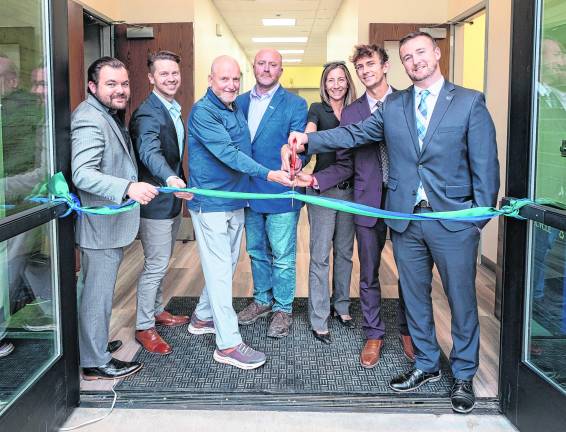 <b>James Santonastaso, Member, SCCC Board of Trustees; Jack Stafford, Supervisor of Optics Technology; Herb Yardley, Chair, SCCC Board of Trustees; Jason Fruge, Dean of Technical Occupations; Dr. Elizabeth Silverthorne, Vice Chair, SCCC Board of Trustees; Jack DeGroot, Deputy Director, Sussex County Commissioners; and Dr. Cory Homer, President, SCCC.</b>