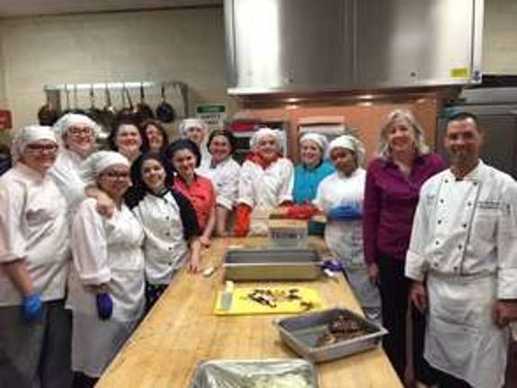 Tech school chefs get together with Coldwell Banker agents.