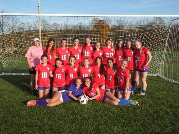 The 2023 Kittatinny Regional High School varsity girls soccer team and their coach Jeanette Spooner, top row at left.