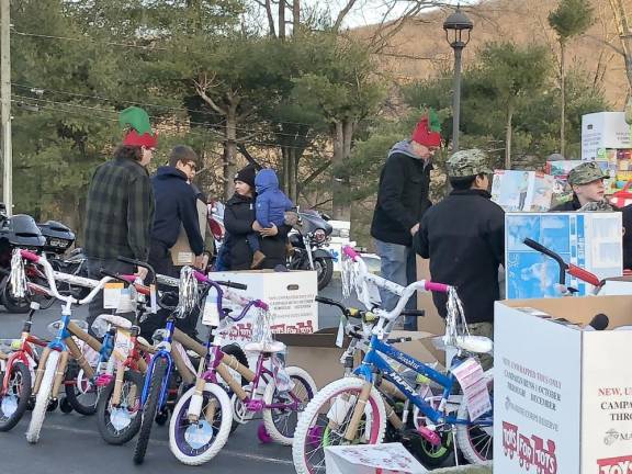Four truckloads of donated toys, including several bicycles, were brought to the Sparta Station by the Warlocks motorcycle club, based in Hardyston.