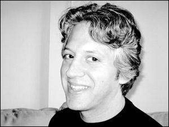 Book signings will be homecoming for author Hollander