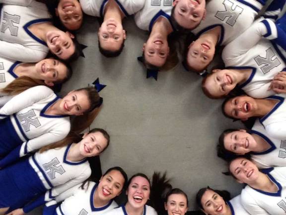 The girls circle up in prep for competition.