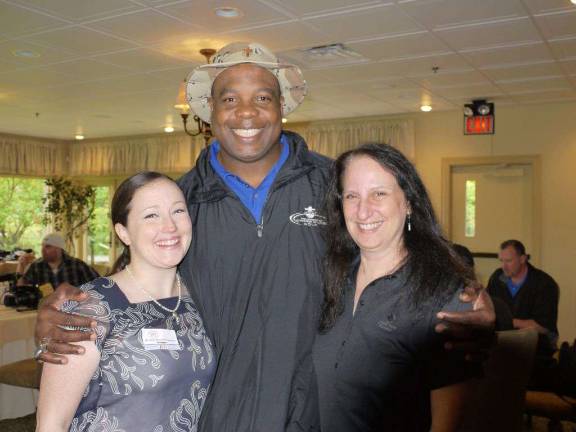 From left, volunteer Allison Reynolds, Lee Rouson and Faye Harac