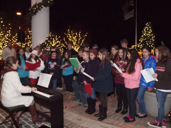 The Halsted Street Middle School choir sing. The school is located in Newton, N.J. The 22nd Annual C. Edward McCracken Festival of Lights took place in Newton, New Jersey on Saturday, November 16, 2013. Newton Medical Center was the location of the event.