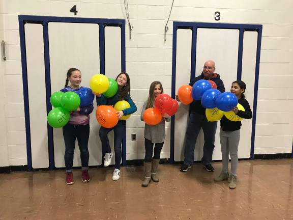Gabby Trentacosta, Erin Dietz, Molly Pavese, and Nina Graceffo on Byram Family Math Night. (Photo provided).