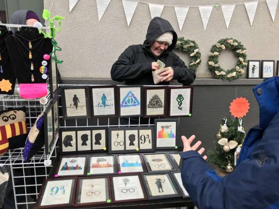 Regulars at Wizard Con events, the owners of Muggles in Manhattan said last year they earned $5,500 in a day from sales of their book art. Unfortunately this year with smaller crowds, they sold a fraction of that amount. But they're hoping next year's crowd size will be just right. (Photo provided).