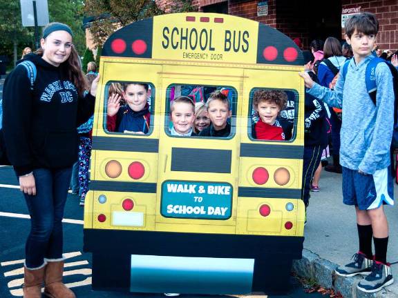 Valley Road students Patrice Kali, Sean and Jake Palermo, Samantha Balogh, Jasper Balogh, Max Yanagi and Matt Herman pose for a photo after walking to school. Photo by Jen Palermo