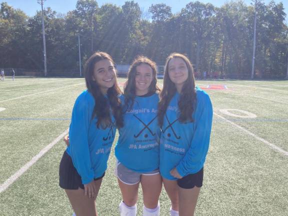 From left are Bethany Mayer, Ella Gomez and Lindsay Fehir, captains of the Lenape Valley Regional High School field hockey team . (Photo by Rachel Orr)