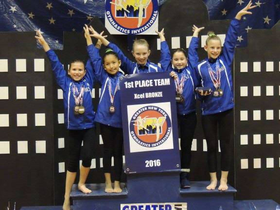 First place bronze team at Greater NY Meet, from left: Milly Dobbs, Victoria Ciliberti, Emma Hamilton (all of Sparta), Lucy Sauchelli (Newton) and Hannah Lounsbury (Milford, PA)