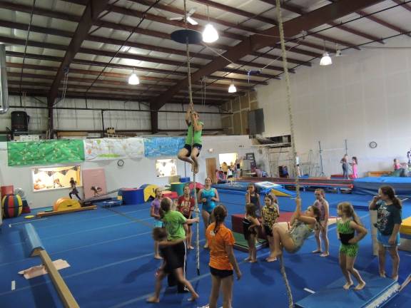 Local gymnastics gym celebrates Summer Olympics