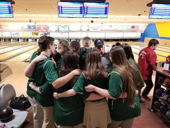 The Sussex Tech Mustangs huddle before a game. The team continues to rack up big wins.