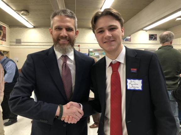Jonathan Rose, left, shakes hands with Billy Marotta-LaRegina. Both were seeking to represent Sussex County on the State Republican Committee.