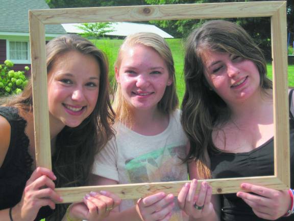 Claire Bodio, of Meximieux, France and the Winfield girls, of Hampton.