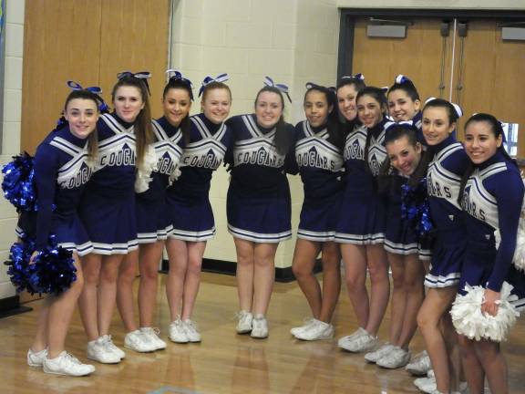The Kittatinny Regional High School varsity cheerleaders pose for a portrait.