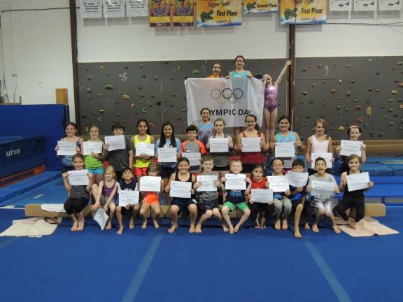 Local gymnastics gym celebrates Summer Olympics