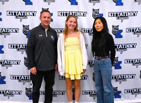 Kittatinny Regional High School student Lillian Gallant is shown with Principal Brian Bosworth and history teacher Ms. Im.