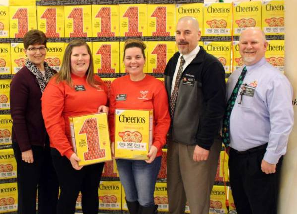 From left, Cathie Miller, Consumer Affairs Coordinator; Robin Harvey and Amanda Pierce, Partners in Caring Captains; John DeCarlo, Newton Store Manager; and Don Morgan, Assistant Store Manager
