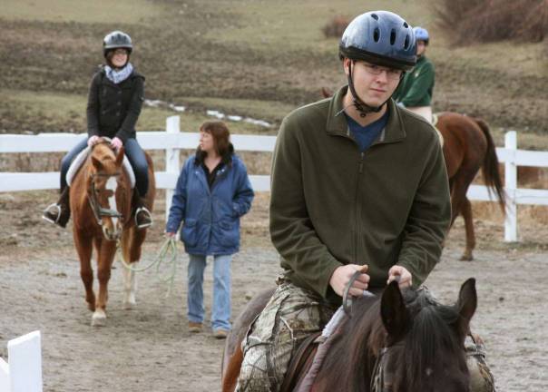 Christopher Rozek (Crew Vice President) riding Zip and Olivia Dan riding Maddie.