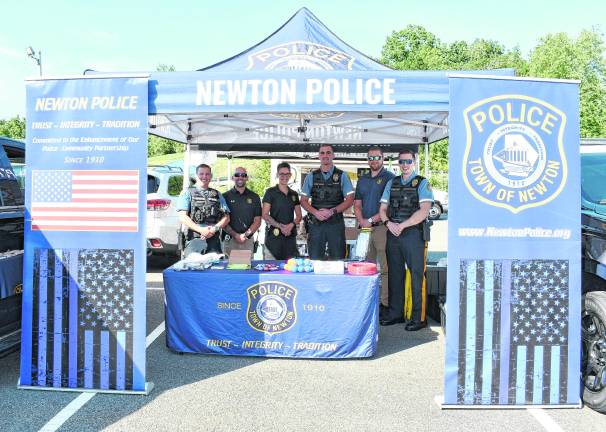 Lt. Jared Zappa, Det. Erik Soroka, Det. Sgt. Judy Torres, Sgt. Garrett Armstrong, Det. Peter Vex and Lt. Russell Post of the Newton Police Dept. pose for a photo.