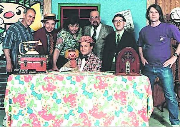 Uncle Floyd Vivino is shown with the rest of hte cast of the Uncle Floyd Show.